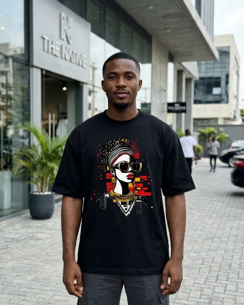 Young Nigerian man in Victoria Island Lagos wearing the Shakara Drip Red Lips Glitch oversized black graphic tee